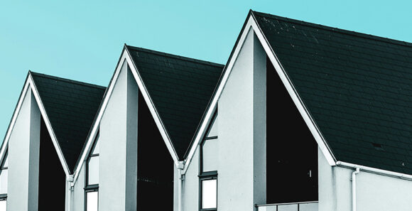 row of houses with real estate insurance